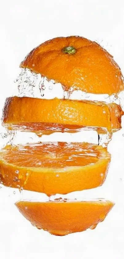 Sliced orange with water splash on white background.