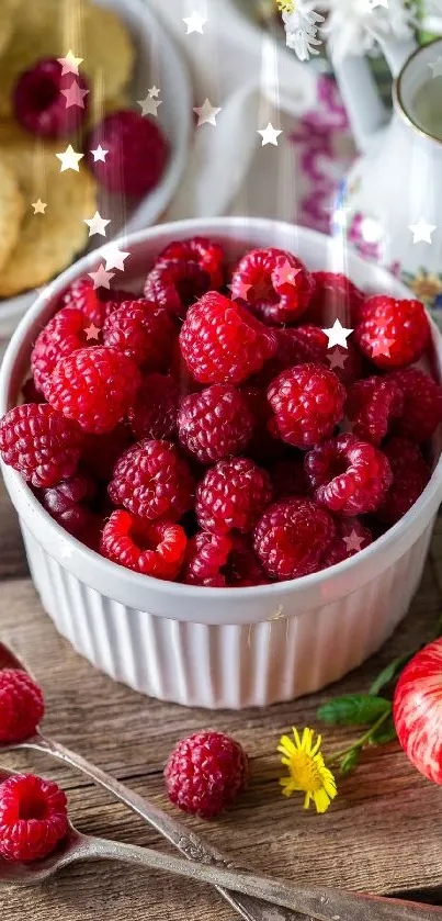 Fresh raspberries in a white bowl with rustic decor and flowers.