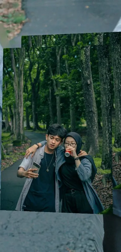 Two friends on a forest path enjoying drinks.