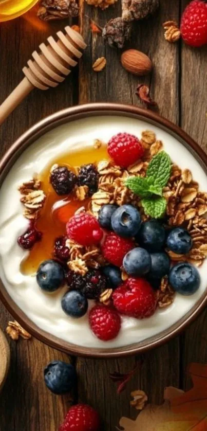 Bowl of yogurt topped with fresh berries and granola.