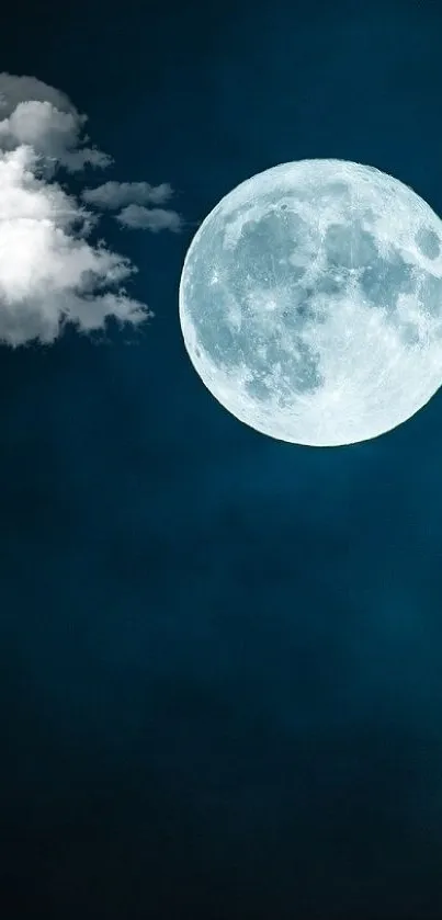 Full moon in a dark blue night sky.