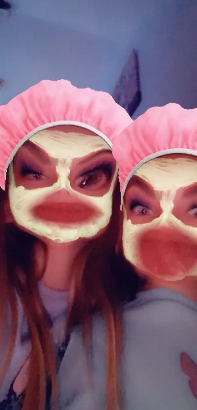 Selfie with fun duck filter and pink hats.