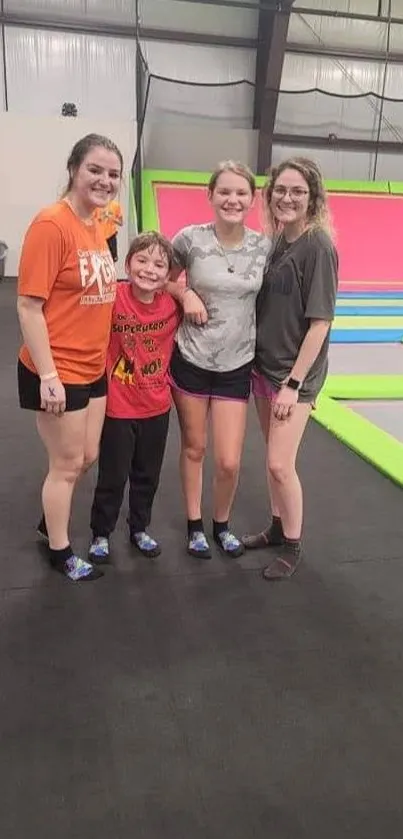 Friends enjoying at a colorful trampoline park.