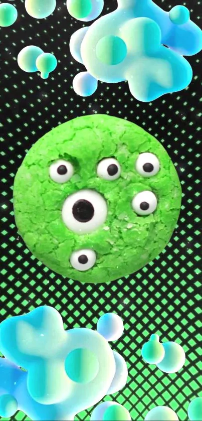 Green alien cookie with five eyes on a funky patterned background.