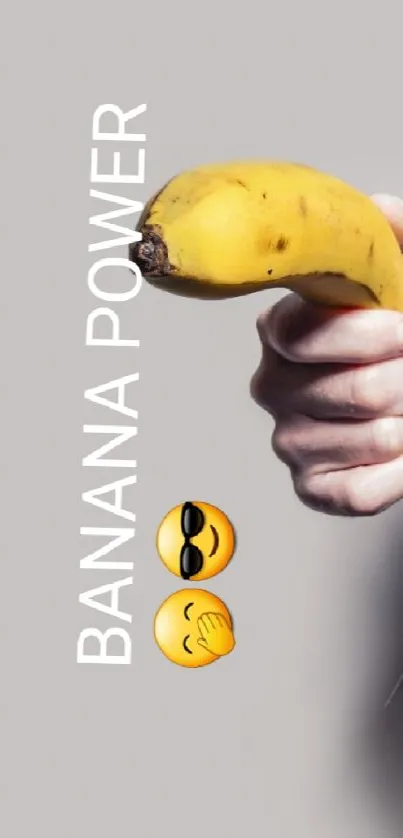 Man in suit holding banana with text 'Banana Power' and emojis on light gray background.