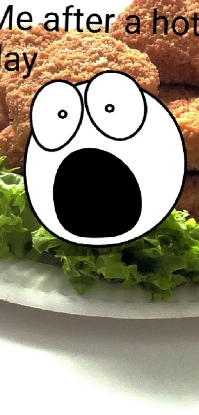 Humorous cartoon face on chicken nuggets with lettuce on a plate.