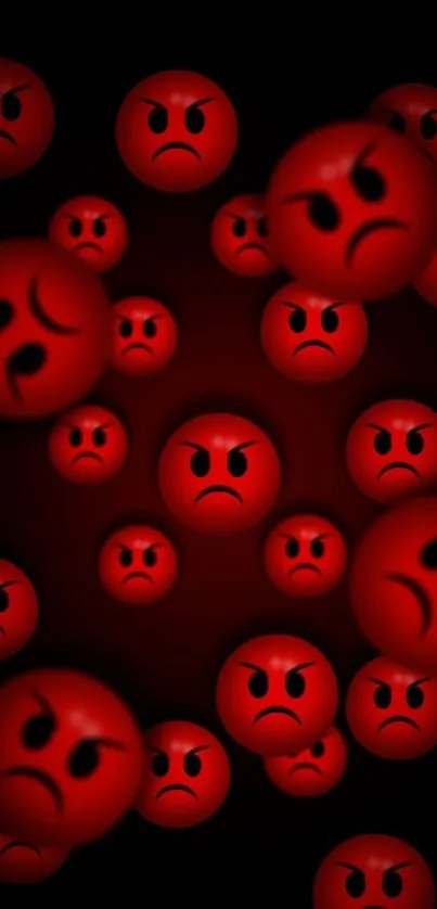 Mobile wallpaper featuring angry red emojis on a dark background.