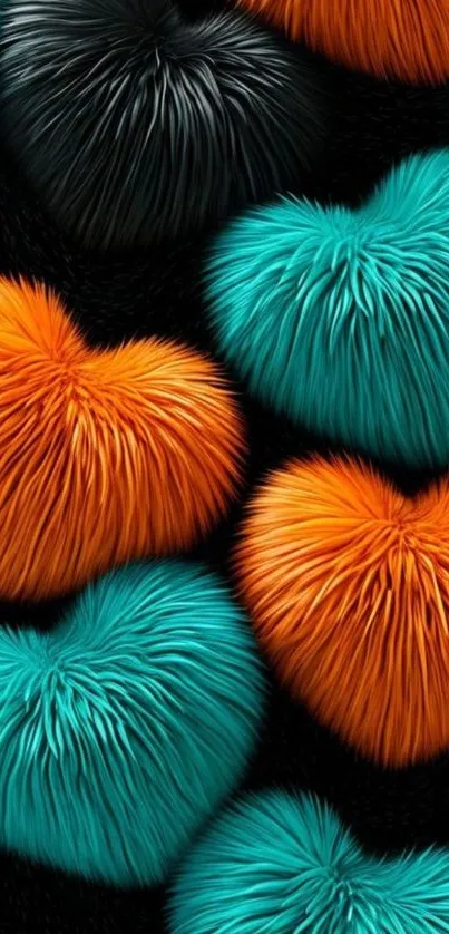 Abstract wallpaper with furry teal and orange hearts on black background.