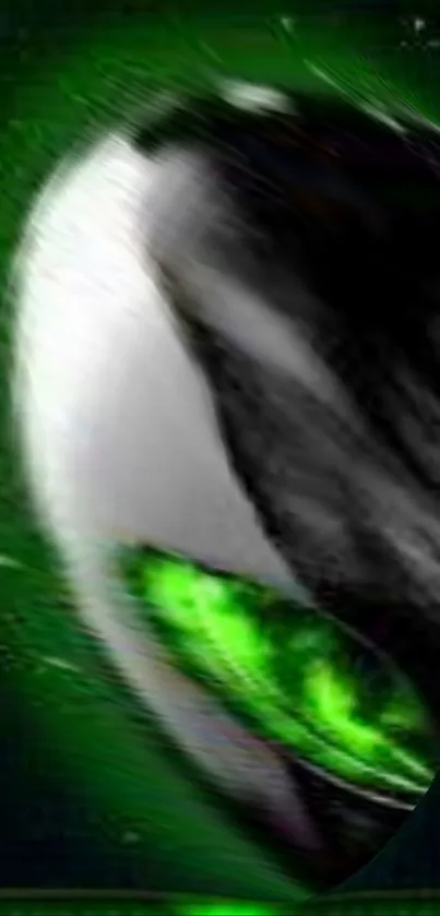 Abstract green alien face with glowing eye.