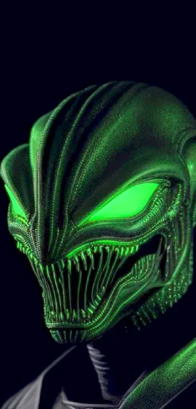 Green glowing alien mask on dark background.