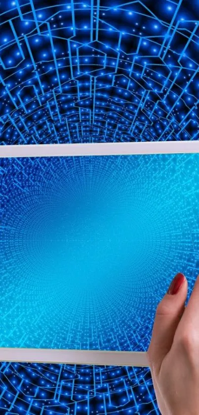 Hand holding tablet with futuristic blue digital patterns.