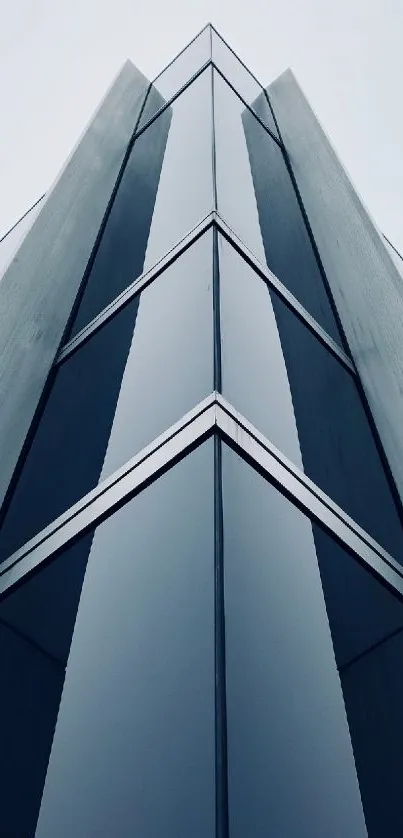 Futuristic steel blue building wallpaper with geometric symmetry.