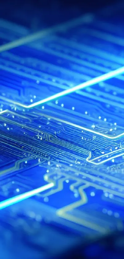 Futuristic blue circuit board wallpaper with glowing patterns.