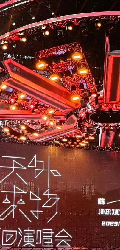 Futuristic concert stage with red lighting.