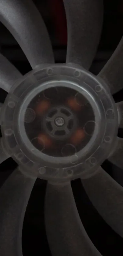 Close-up of transparent fan blade design in gray tones.