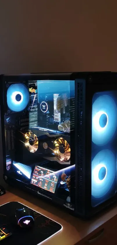 Futuristic gaming setup with glowing blue PC fans and vibrant keyboard.