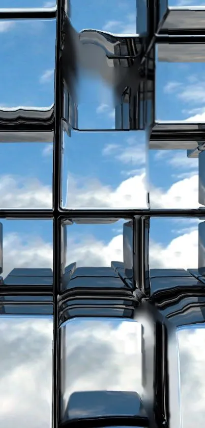 Futuristic glass cubes reflecting a blue sky.