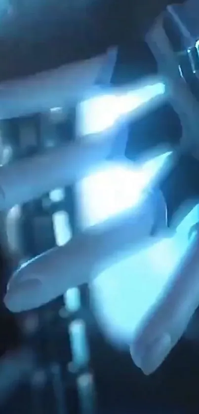 Futuristic glowing hand in blue light wallpaper.