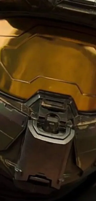 Close-up of a futuristic helmet with a gold visor design.