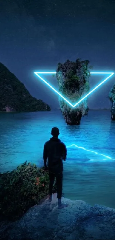 Person stands before a lake with neon triangle at night.