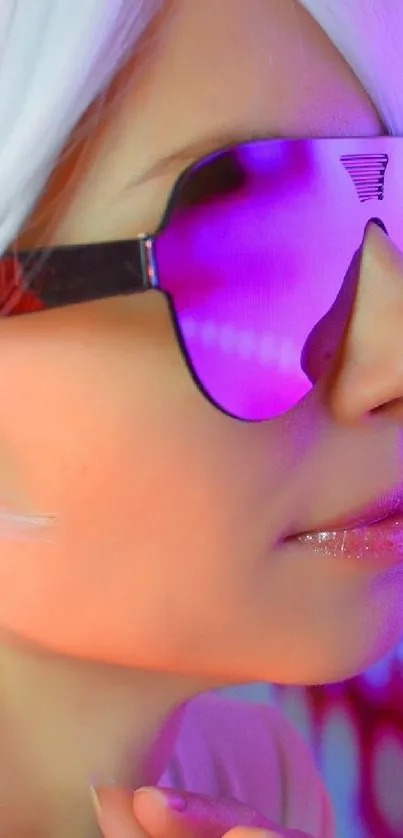 Person wearing pink reflective sunglasses close-up.