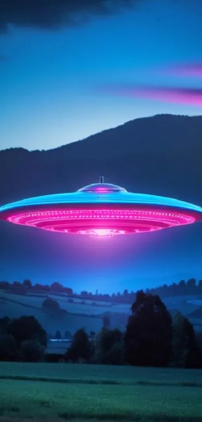 Colorful UFO floating above mountain landscape at night.