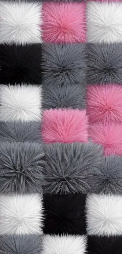 Fuzzy pattern wallpaper with pink, black, gray squares.