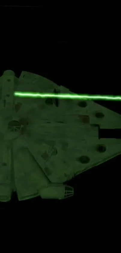 Futuristic spaceship with green laser in deep black space.