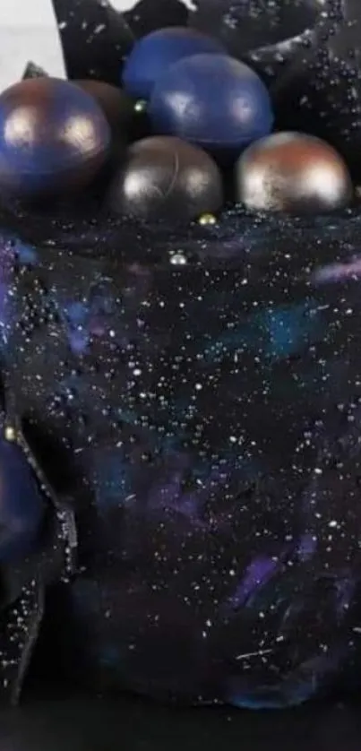 Galaxy themed cake with dark colors and cosmic details.