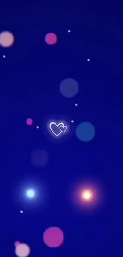 Blue wallpaper with a heart and glowing orbs.