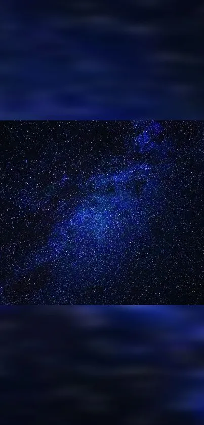 Dark blue galaxy wallpaper with stars.