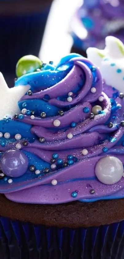 Galaxy-themed cupcake with purple icing.