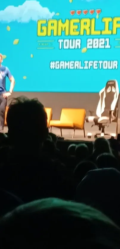 GamerLife Tour 2021 stage with audience and gaming chair.