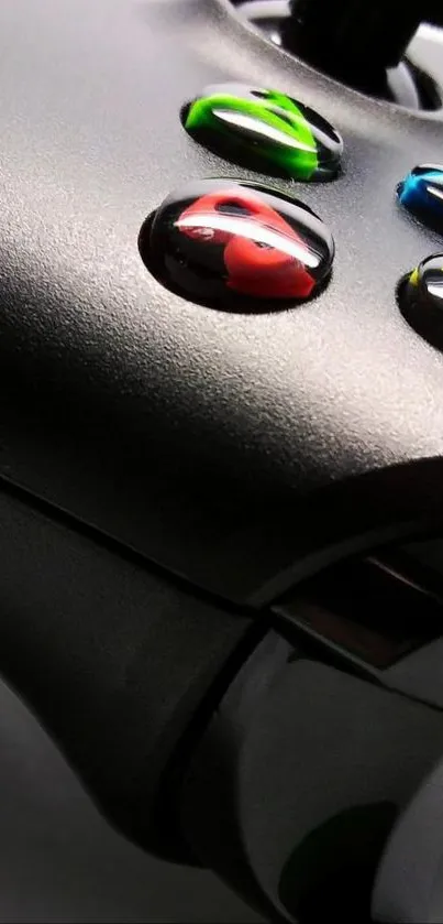 Close-up of gaming controller with colorful buttons.