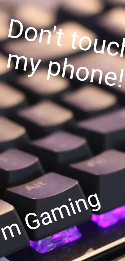 Close-up of gaming keyboard with purple lighting and text overlay.