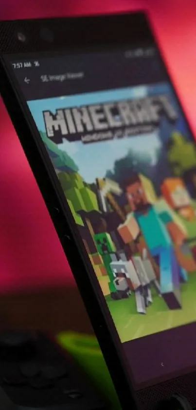 Mobile phone with Minecraft, headphones, and game controllers.