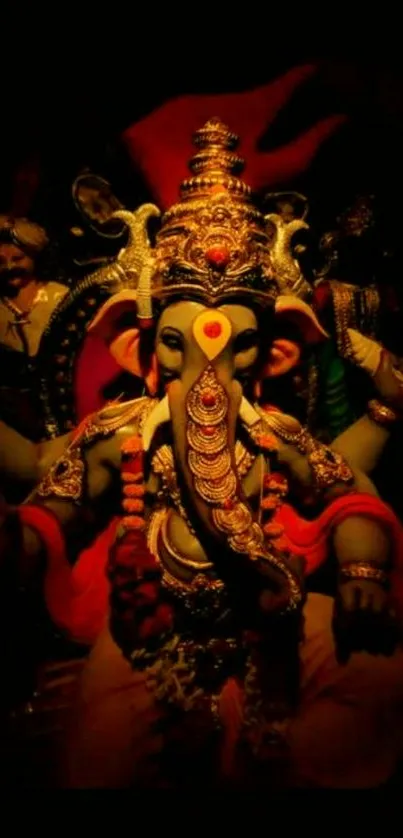 Vibrant statue of Ganesh on a phone wallpaper.