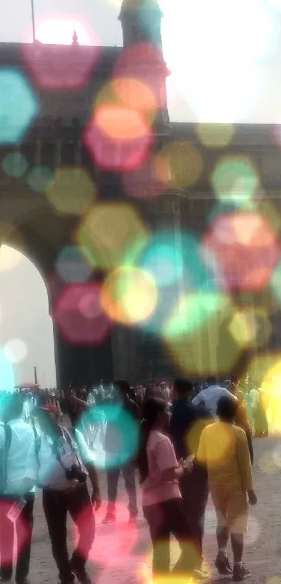 Crowd at Gateway of India with historic architecture.