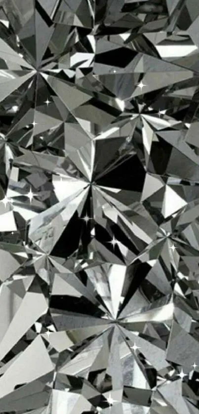 Geometric silver crystal design wallpaper with sharp facets and reflections.