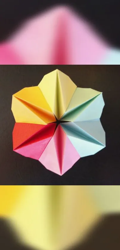 Vibrant geometric origami art wallpaper with colorful paper folds.