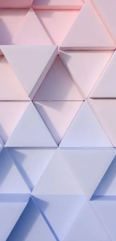 Pastel geometric triangle pattern wallpaper with soft pink and lavender hues.