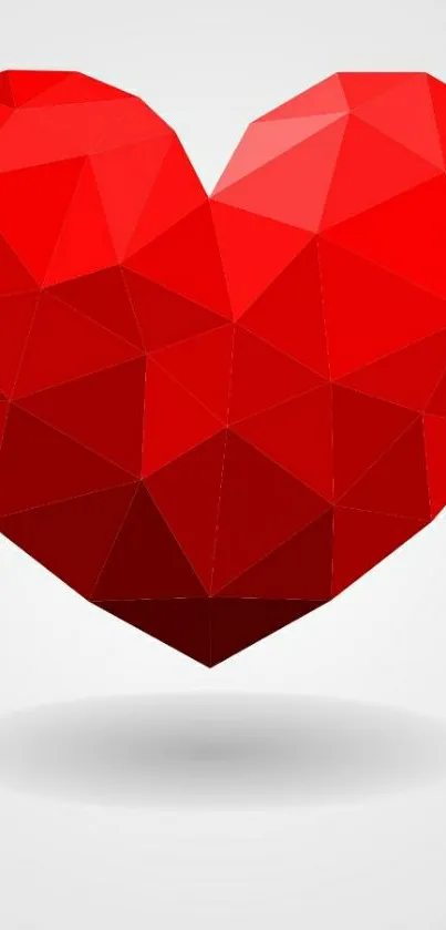 Geometric red heart on a white background.