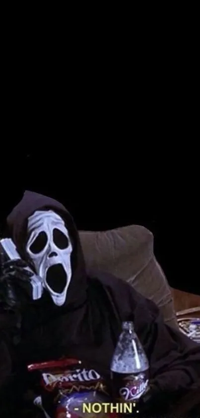 Ghost mask figure relaxing on a couch with snacks and a dark background.