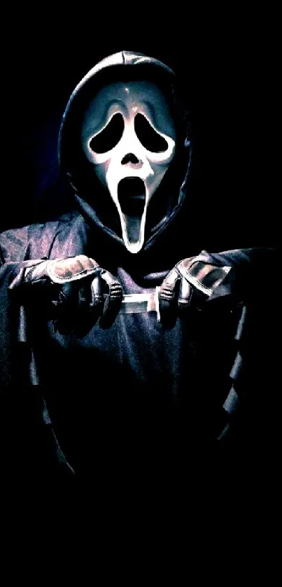 Dark ghostly figure with white mask on a black background.