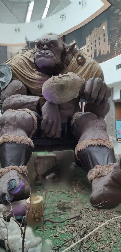 A giant troll statue inside a shopping mall setting, capturing fantasy and art themes.