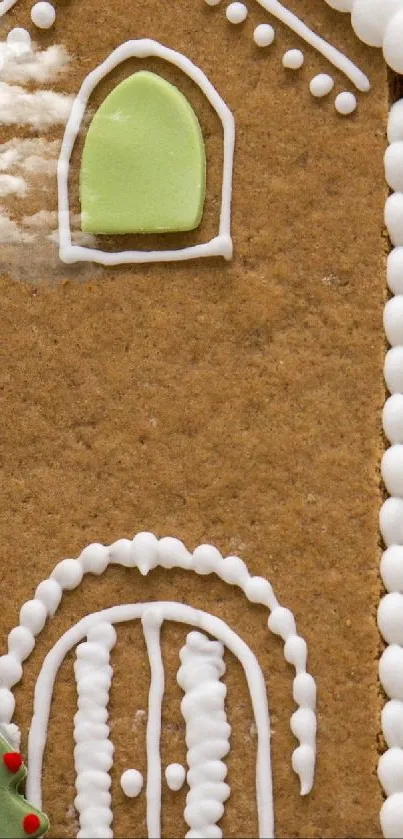 Gingerbread house with elf and candy decorations.