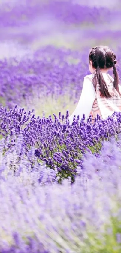 Girl walking through lavender field, serene and peaceful.