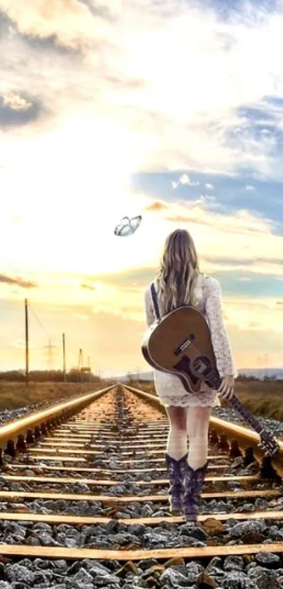 Girl with guitar walking on railway track at sunset.