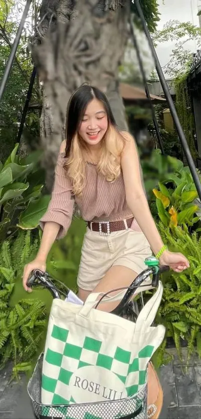 Smiling girl with bicycle in a lush garden setting.