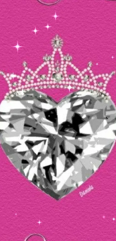 Heart diamond with crown on pink background.